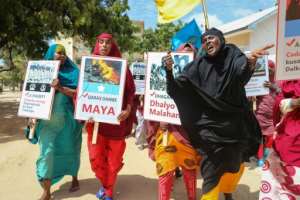 Somali women protested against Al-Shabaab in Mogadishu days after the massive car-bomb attack in the city. By Abdirazak Hussein FARAH (AFP/File)