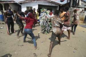 Some of the dancers were dressed in costumes made from plastic waste. By PIUS UTOMI EKPEI (AFP)