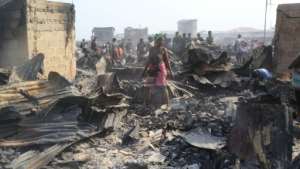 Some residents lost everything in the fire.  The narrow passages of the slum made it impossible for fire trucks to pass.  By Saidu BAH (AFP)