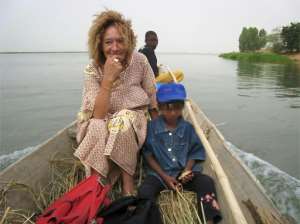Sophie Petronin pictured working with children in Africa in an undated photo circulated by a group of supporters seeking her release. By Handout (www.liberons-sophie.fr/AFP/File)
