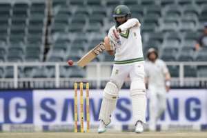 South Africa batsman Hashim Amla plays a shot during the fourth day of the third Test against India at Wanderers cricket ground in Johannesburg on January 27, 2018