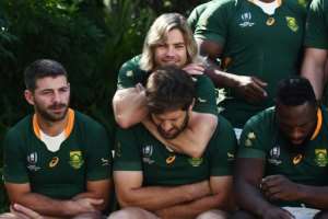 South Africa scrum-half Faf de Klerk (top) jokes with centre Frans Steyn. By CHARLY TRIBALLEAU (AFP/File)