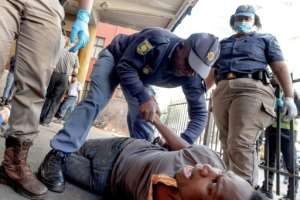 South African police have been arresting those suspected of breaking the alcohol sales ban during the lockdown. By Luca Sola (AFP)