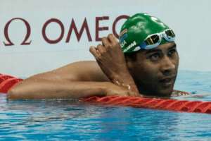 South Africa's Achmat Hassiem reacts after competing a heat of men's 100 m freestyle (S10) of the Rio 2016 Paralympic Games