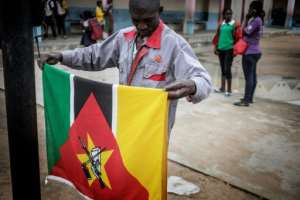 Soviet symbols in Africa include the Kalashnikov rifle featured on the flag of Mozambique. By GIANLUIGI GUERCIA (AFP)