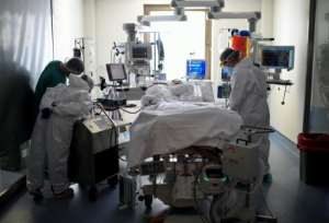 Spain has a death toll of about 33,400 from the coronavirus. By OSCAR DEL POZO (AFP)