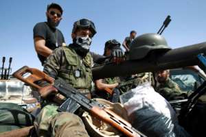 Special forces of the self-proclaimed eastern Libyan National Army loyal to strongman Khalifa Haftar in the eastern city of Benghazi. By Abdullah DOMA (AFP/File)