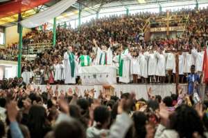 Standing room: Sunday mass with Father Pedro. By GIANLUIGI GUERCIA (AFP)