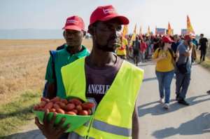 Striking demonstrators shouted