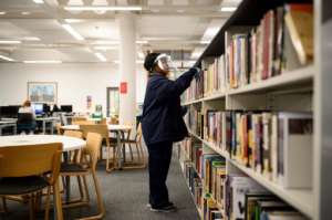 Students' social lives are limited, with many welcoming events held virtually. By OLI SCARFF (AFP)