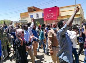 Sudanese protesters chant slogans when they respond to a call to go to the army headquarters in Khartoum. By STRINGER (AFP)