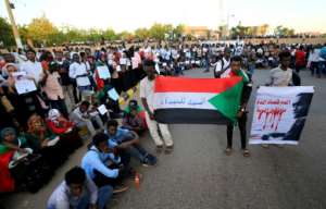 Sudanese protesters staged a demonstration on December 3, calling on authorities to deliver justice for those killed in demonstrations against the now ousted Bashir. By ASHRAF SHAZLY (AFP/File)