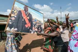Support for Gbagbo remains strong despite his long absence. Above: Celebrations in his home town of Gagnoa after his acquittal by the International Criminal Court in January 2019. By Sia KAMBOU (AFP)