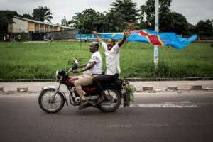 Supporters of DR Congo's traditional opposition leader Felix Tshisekedi celebrate after he was declared the winner of December's presidential election.  By John WESSELS (AFP)