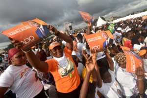 Supporters of incumbent president Alassane Ouattara say he is allowed to run for a third term, which the opposition disputes. By SIA KAMBOU (AFP)