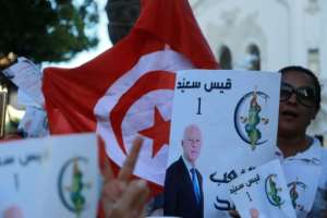 Supporters of Tunisian presidential candidate Kais Saied rally in the capital on October 11. By ANIS MILI (AFP)
