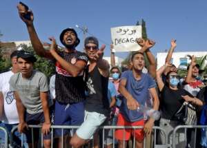 Supporters of Tunisia's President Kais Saied took to the streets to back his actions. By FETHI BELAID (AFP/File)