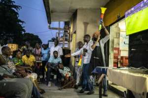 Supporters prefer to gather in bars to watch matches on television, like here in Douala. By Charly TRIBALLEAU (AFP)