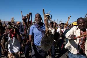 Partisans, some armed, gathered in front of Zuma's rural house in Nkandla.  By Emmanuel Croset (AFP)