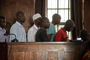 Suspects at the first hearing represented a cross-section of Ugandan society, from unemployed young men to a middle-aged university lecturer.. By Isaac KASAMANI (AFP/File)