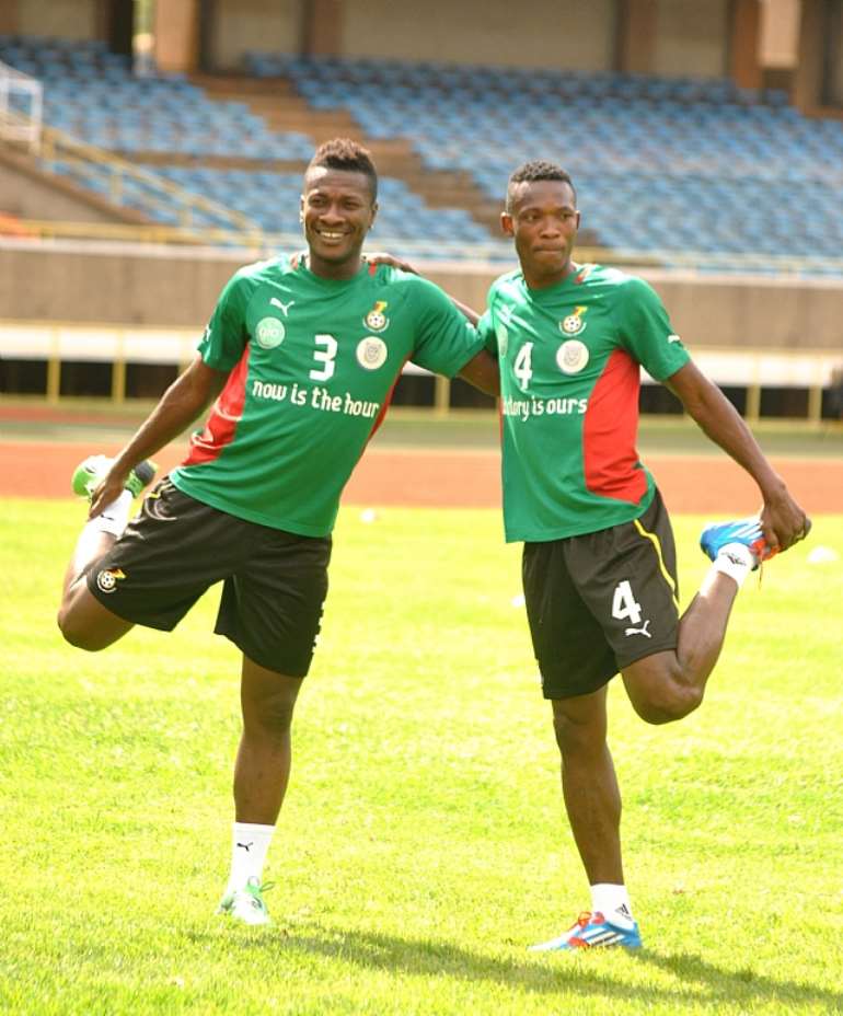ASAMOAH GYAN AND JOHN PAINTSIL GHANA NATIONAL SOCCER STARS WARMING UP AT KASARANI STADIUM-DAVID NDOLO