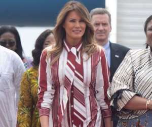 Melania Trump (left) with Rebecca Akufo-Addo at the airport