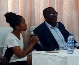Bright Ernest Ankomea and his interpreter before the Commission
