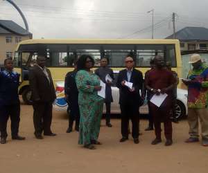 Members of the Commission and police personnel visit the shooting scene