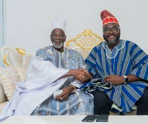 Ya Na Abukari Mahama II in a handshake with Opoku-Ahweneeh Danquah (R) – CEO of GNPC