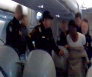 UMAR AFTER HIS ARREST IN THE PLANE. Photo: CNN 