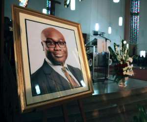 A portrait of BBC presenter Komla Dumor is set during his funeral on February 21, 2014, in Accra, Ghana.  By Chris Stein (AFP)