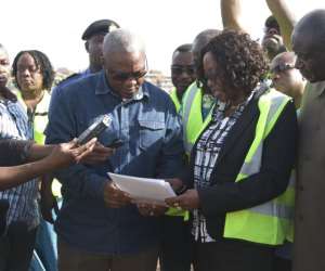 Dzifa Attivor explaining a point to President Mahama