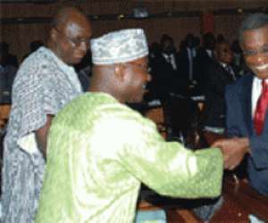 President Mills in a handshake with Mr Osei Kyei-Mensah Bonsu, the Minority Leader.
