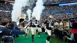 New Orleans Saints quarterback Tyler Shough (6) leads the team onto the field for an NFL football game against Pittsburgh Steelers in Saint-Denis, near Paris, October 25, 2026. - AP Photo/Steve Luciano - Steve Luciano - AP Photo/Steve Luciano - Steve Luciano