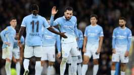 Carabao Cup: Holders Manchester City edge past Brighton on penalties