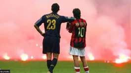 ReutersImage caption: An image of Inter defender Marco Materazzi leaning on the shoulder of Milan attacker Rui Costa has become one to symbolise the teams local rivalry