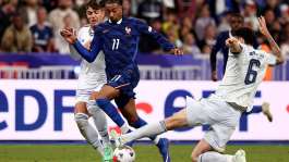Michael Olise in action for France against Italy in the UEFA Nations League at the Stade de France in Saint-Denis, near Paris on October 2, 2026. -  Franck Fife, AFP