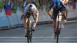Remco Evenepoel (left) crosses the finish line to win ahead of Giulio Ciccone. -  Jure Makovec, AFP