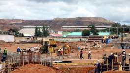 Zambian workers build a copper smelter in Chingola, Zambia. Zambia has accused the United States of linking a proposed health deal to negotiations over critical minerals access. - ASSOCIATED PRESS - Joseph Schatz