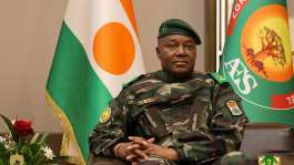The head of the Nigerien junta, General Abdourahamane Tiani, looks on as he welcomes Beninese President Romuald Wadagni during the first leg of a visit to Niger and Burkina Faso, in Niamey, Niger 2 June 2026. - via REUTERS - Niger Presidency