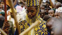 File - Ugandas King of the Tooro Kingdom, King Oyo Nyimba Kabamba Iguru Rukidi IV, during his 18th birthday at Fort Portal, Uganda on April 17, 2010 as he assumed the full duties of King of the Tooros. -  Marc Hofer, AP
