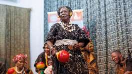 Malian singer, dancer and instrumentalist Mariam Bagayoko dances while performing at the Palais de la Culture in Bamako on 14 August, 2026. - AFP - -