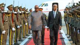 Mahamaarrives in Luanda for AU Summit