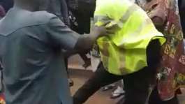 Video: KMA city guard brutally beats woman to pulp at Kejetia