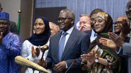 Billionaire Aliko Dangote (C) launched an IPO of his refinery, which has become the largest supplier of jet fuel to Europe -  Temiloluwa Johnson, AFP