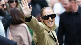 Canadian singer Celine Dion waves to fans as she arrives at Hotel Le Royal Monceau in Paris on 28 August 2026, ahead of her series of concerts in the French capital. -  AFP - THOMAS SAMSON