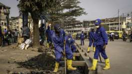 The recruits, nicknamed builders, appeared on the streets in June.  By GLODY MURHABAZI (AFP)