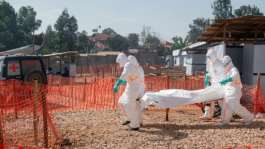 The response to the Ebola outbreak in the DR Congo has been complicated by conflict and the tradition of families touching the body of the deceased at burials.  By Jospin Mwisha (AFP/File)
