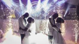 Twin brothers Taiwo and Kehinde Oguntoye dance with twin sisters Taiwo and Kehinde Adediran at their double wedding reception.  By OLYMPIA DE MAISMONT (AFP)