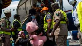 A chartered plane carrying Nigerian nationals landed at Lagoss Murtala Mohammed International Airport.  By TOYIN ADEDOKUN (AFP)